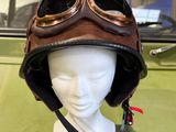 a mannequin head wearing a helmet with goggles on it