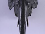 statue of an elephant head on a white background with a white background