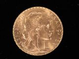 an image of a gold coin with a woman on it