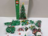 a box of lego christmas tree decorations on a table