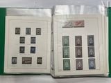 a book with stamps on it sitting on a table