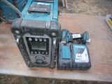 a picture of a cordless drill and a power tool on a table