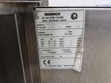 a close up of a stainless steel refrigerator with a price label on it