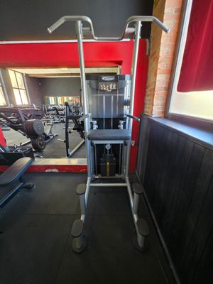 an image of a gym room with equipment in it