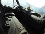 a view of the inside of a vehicle from the driver ' s seat