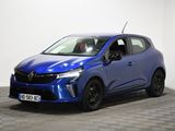 a blue car parked in a room with a checkered floor
