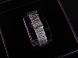 an image of a watch in a box on a black surface