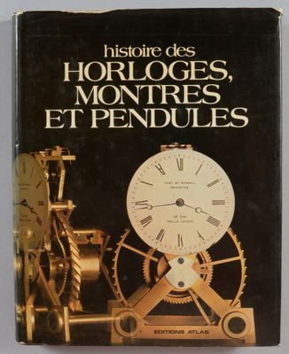 une image représentant un livre sur lequel est posé un horloge