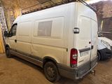 a white van that is parked in a garage