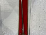 a sword that is on display in a box