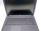 the dell laptop is open and ready to be used