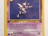 a close up of a pokemon card on a white surface