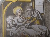 a picture of a painting of a man and a woman sitting on a bed