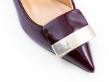 a close up of a pair of shoes on a white surface