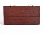an old wooden box with a metal handle on a white background