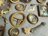 a table with a lot of antique items on it