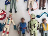a lot of action figures that are on the table