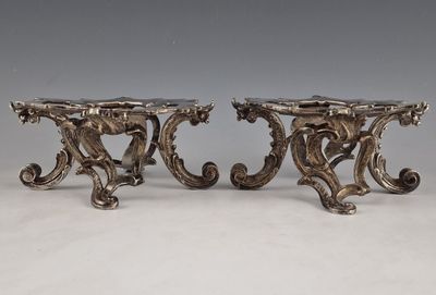 a pair of antique silver plated table bases
