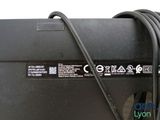 the back of a black box with a black cord attached to it