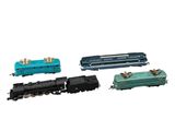 four different types of toy trains on a white background