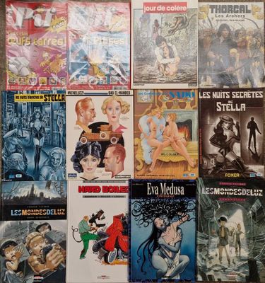 a lot of comic books that are on the table