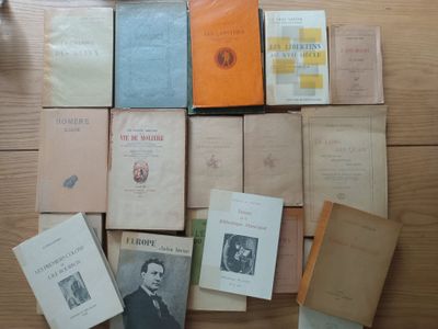 a lot of books on the table together on the floor