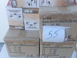 many boxes stacked on top of each other on a table