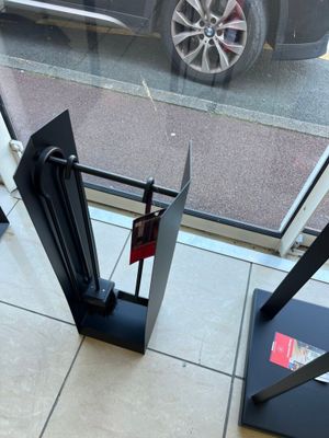 a car that is parked in front of a glass door