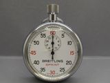 a close up of a stopwatch on a table