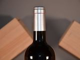 a bottle of wine that is sitting on a table