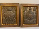 pair of antique carved wood plaques of a lion and a turtle