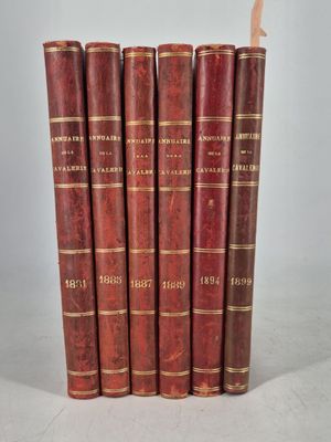 a set of five red books sitting on top of each other