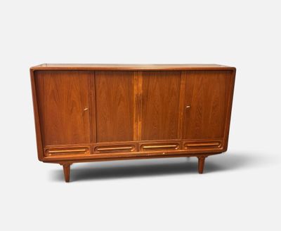 an image of a mid century teak and oak sideboard