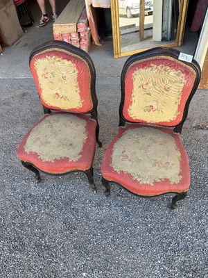 pair of antique chairs with red upholstered upholstered seats