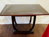 a table that has a red cloth on top of it