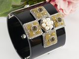 black and gold cuff bracelet with pearls and crosses