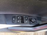 a close up of a car ' s interior with the controls on