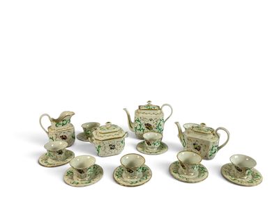 many pieces of porcelain tea and coffee set on the table