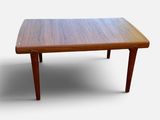 a small table with a wooden top on a white background