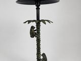 a lamp that is sitting on a table next to a lamp