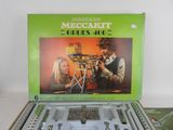 an image of a box with a picture of a man and a woman working on a bicycle