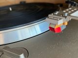 a turntable with a record on top of it