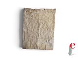 a piece of brown paper on a white surface