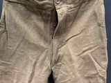 a pair of pants hanging on a clothes line