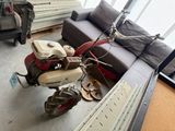 a motor scooter that is parked in a living room