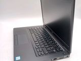 a laptop computer that is sitting on a table