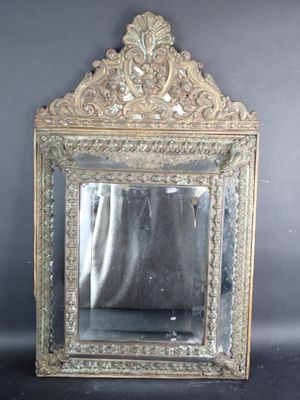 a mirror that is sitting on a table