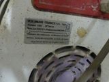 a close up view of a gas stove with a label on it