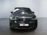 the front view of a black volkswagen e - golf parked in a showroom