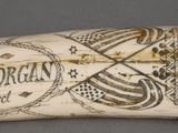 an elephant ' s tusk with writing on it